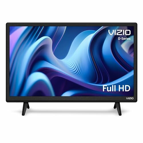 Vizio D-Series Full HD TV with abstract blue wave design on screen.